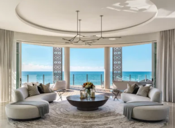 A view of a luxury reception room outside of Glancy Fawcetts Show Space featuring tableware linens and accessories for superyachts residences and private jets in Luxury Resort Albany Bahamas