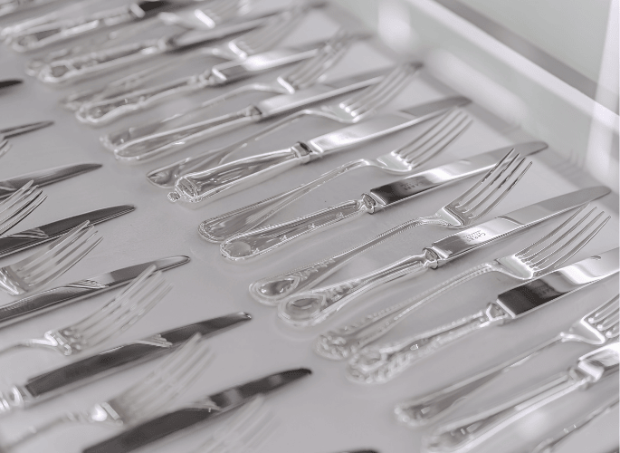 glancy fawcetts abu dhabi showroom - silver and platinum cutlery with modern and opulent patterns